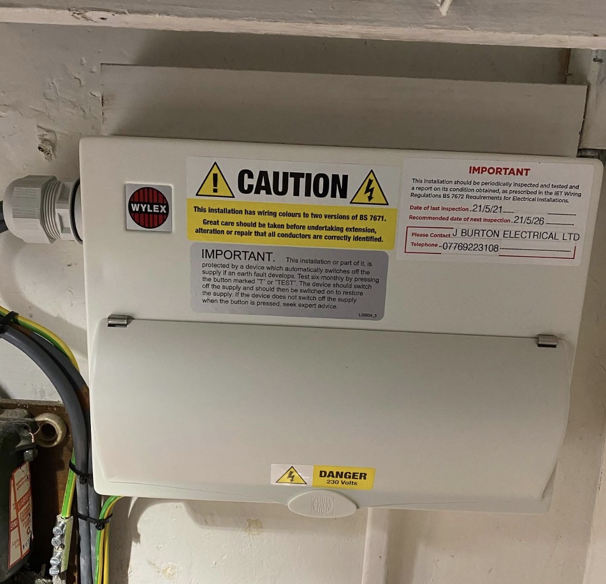 EICR inspection label on a domestic consumer unit
